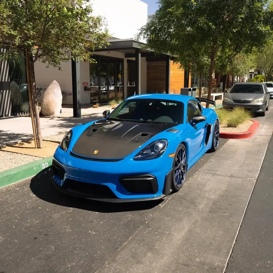 FOR SALE | 2023 Porsche 718 Cayman GT4 RS Ultra-Low Miles | Track-Ready Spec Weissach Package Finished in stunning Shark Blue over a.