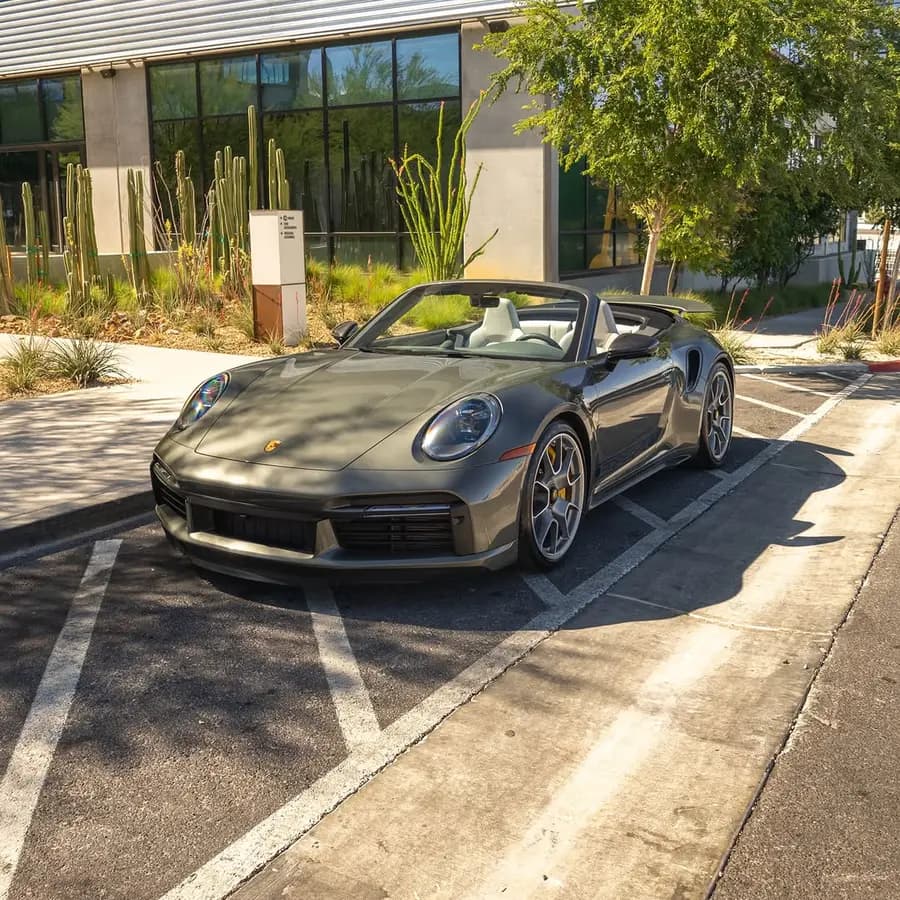 FOR SALE | 2023 Porsche 911 Turbo S Finished in Aventurine Green Metallic over a refined Slate Gray leather interior, this 911 Turbo S.