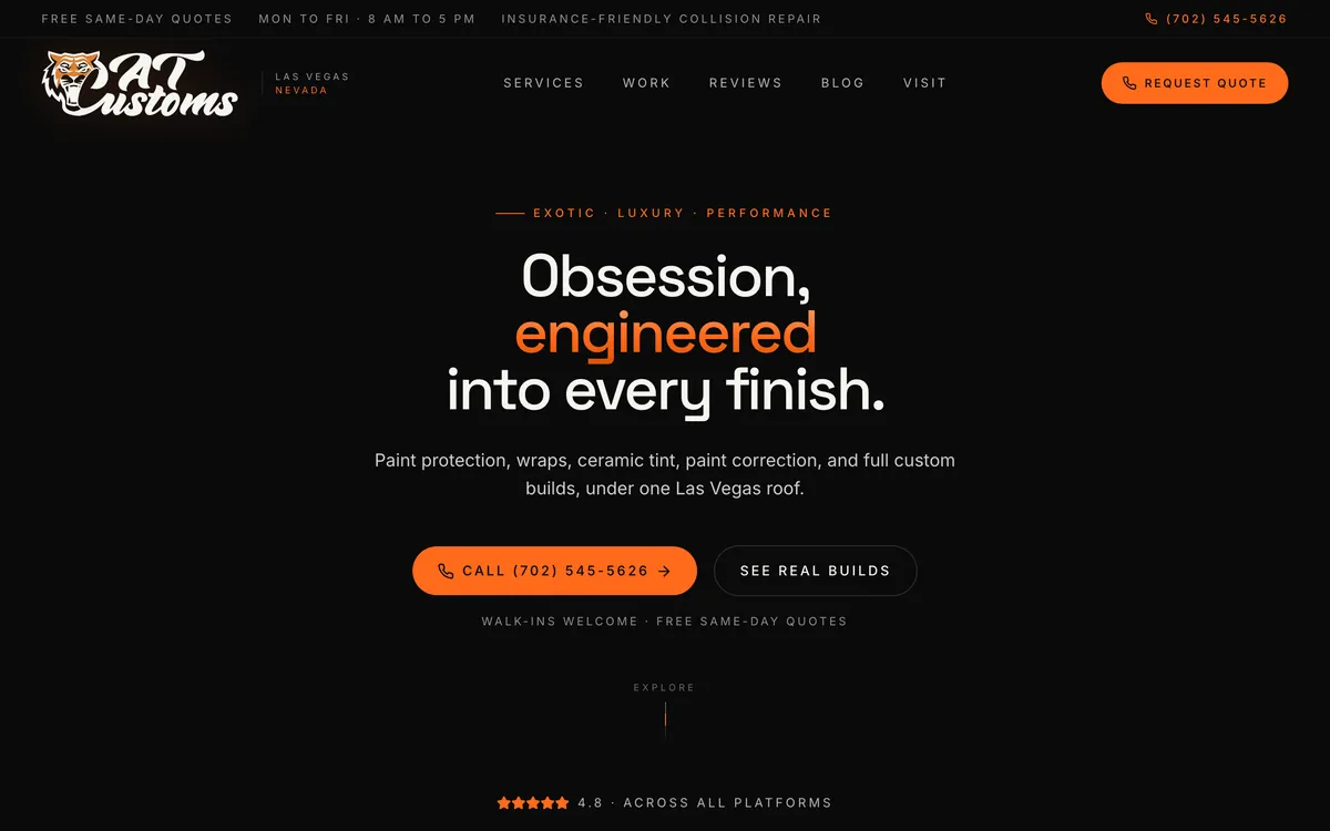Homepage of atcustomslv.com, a Las Vegas custom auto shop website built by Delvixo, with a near-black layout, orange accents, the AT Customs tiger logo, and the headline Obsession, engineered into every finish.
