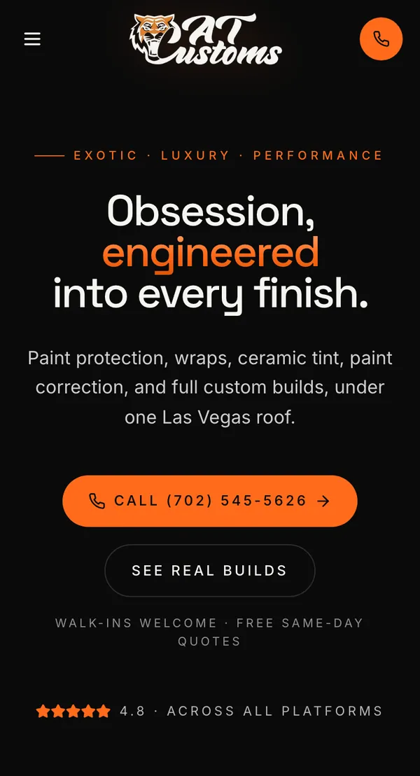 AT Customs website shown on a phone, designed and built by Delvixo