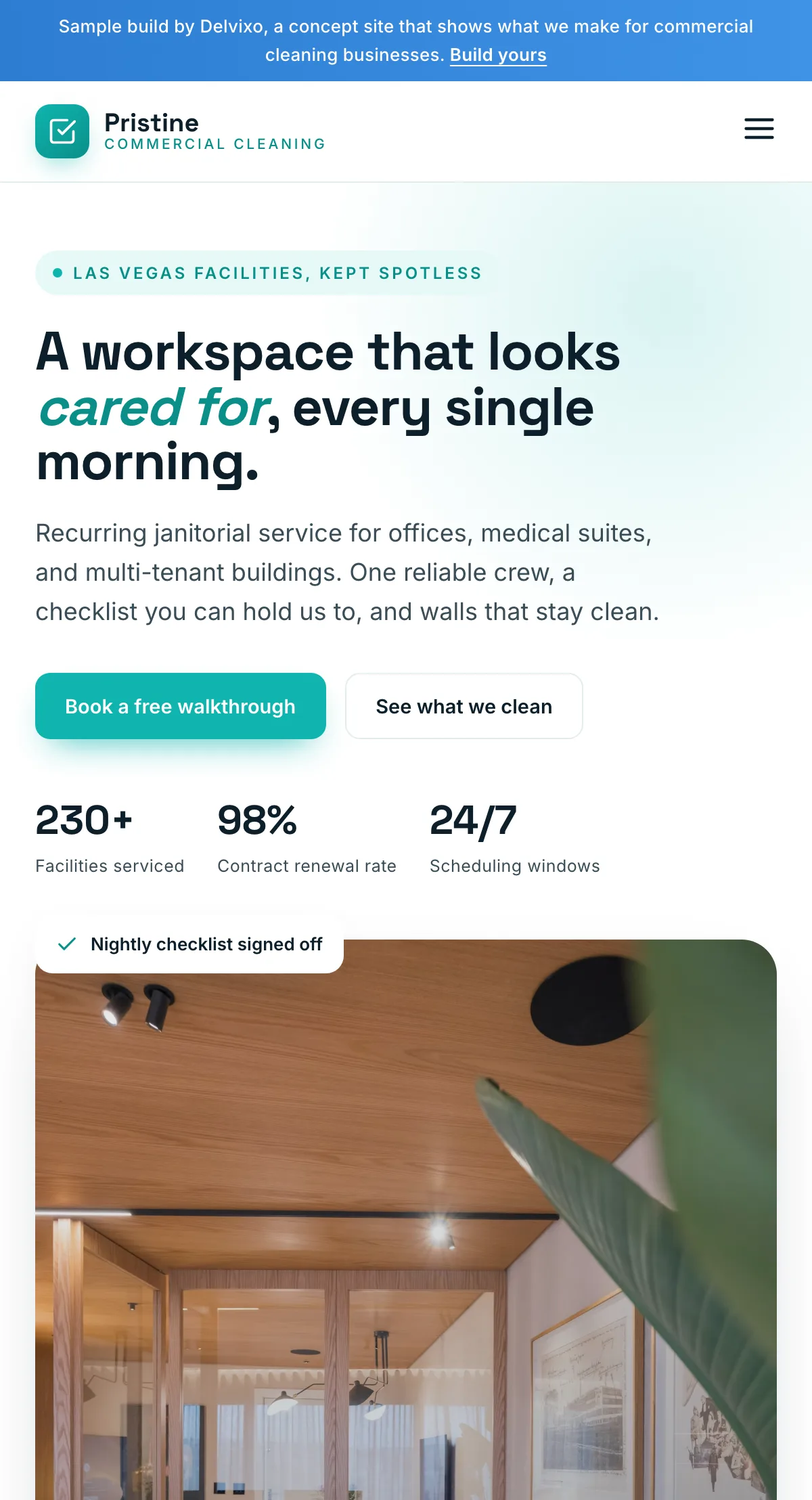 Pristine Commercial Cleaning website shown on a phone, designed and built by Delvixo
